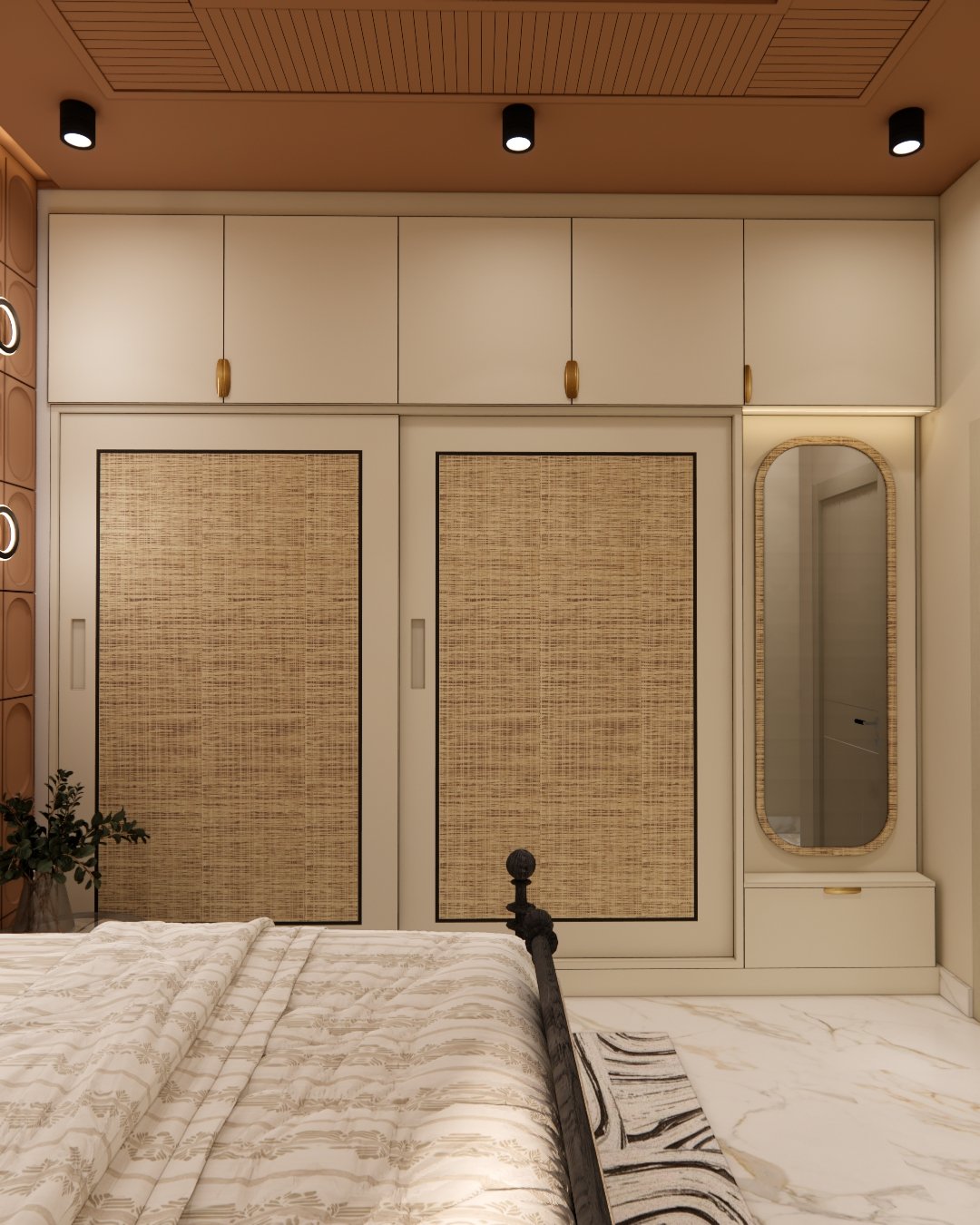 Cream wardrobe with rattan sliding doors and an oval rattan-framed mirror