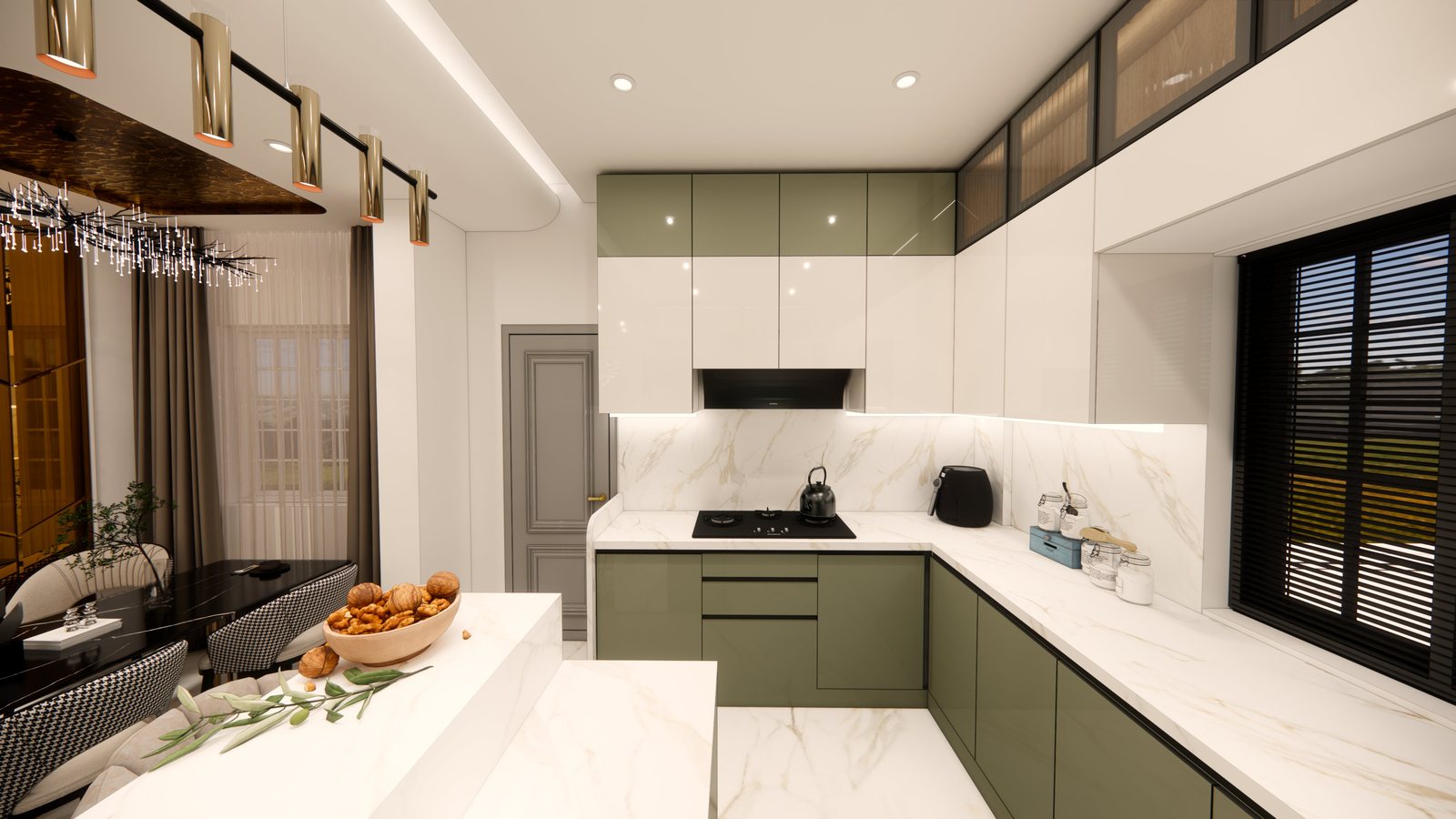Green kitchen with marble counters and dining nook